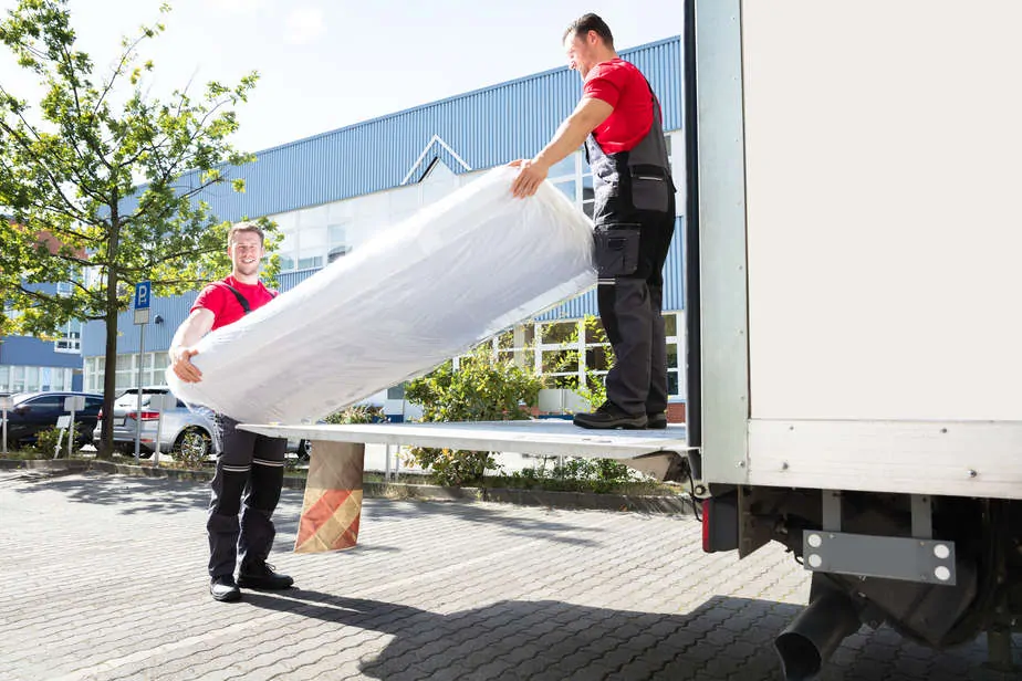 בסט לינק  depositphotos Young Men Unloading The Mattress From Truck On Street