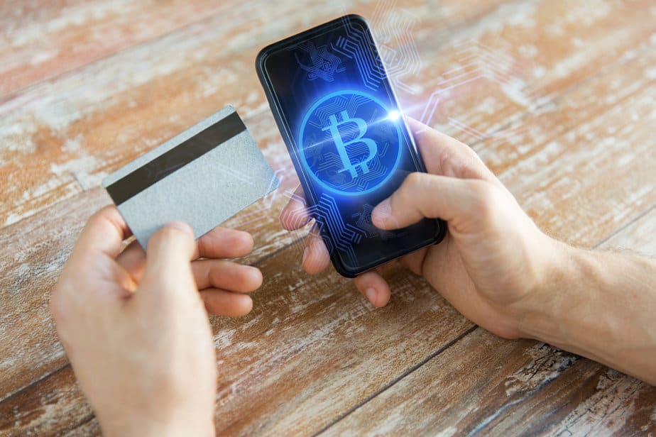 ביי פוסט קרדיט תמונה :depositphotosclose up of bitcoin on smartphone and credit card