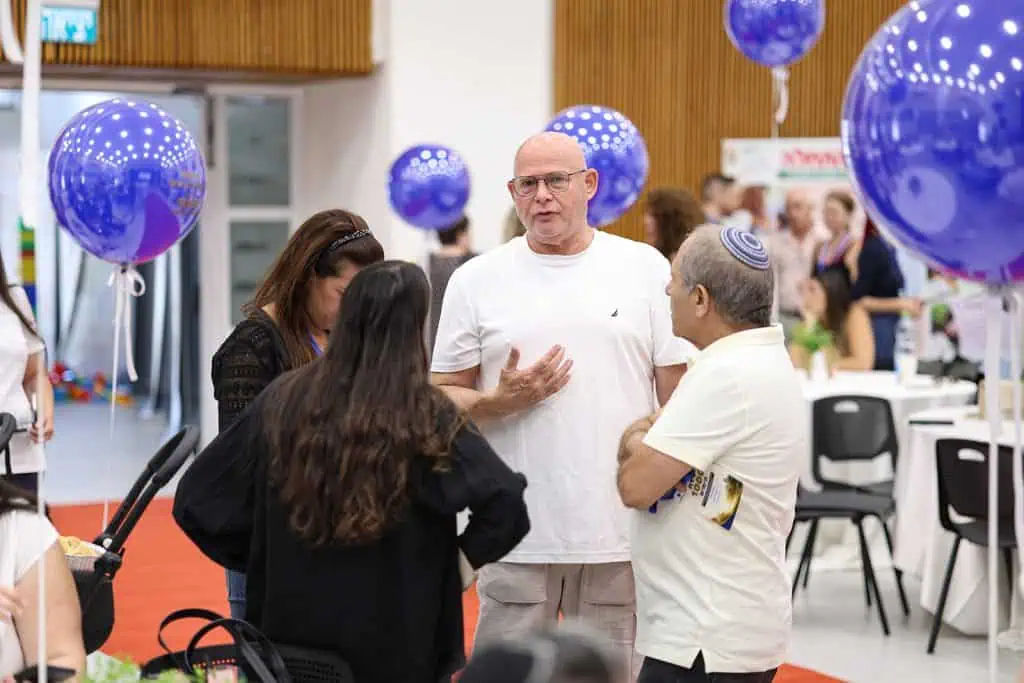 יובב גוניקמן בועידת 1,000 הימים הראשונים ביהוד-מונוסון. צילום: סטודיו ישראל